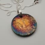 Anodized Silver Apollo 11 Pendant